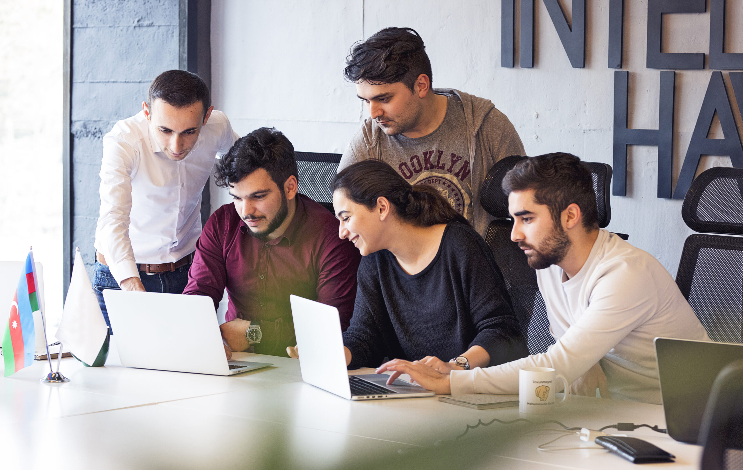 colleagues-working-project-discussing-details